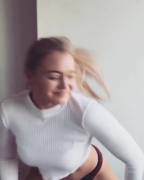 Dancing in her bedroom