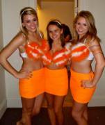 Three in orange