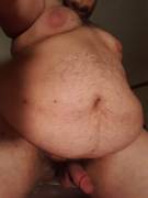 Big belly and hard cock.