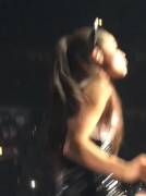 Ariana Grande crawling on stage
