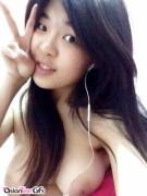 Topless peace sign from Asian cutie