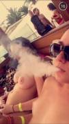 Remy LaCroix smoking by the pool