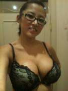 Busty Asian with glasses
