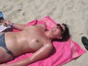 Topless beach milf - because nobody likes tan lines!