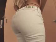 Gina Lynn pulls down white jeans