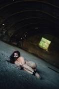 Bound naked in an abandoned hangar