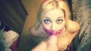 Tape gagged amateur girl blasted with cum (gif)