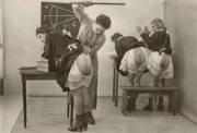 The strict headmistress gives her mischievous students a hard bareass spanking, after they have the audacity to attend a Suffragette rally, demanding a woman's right to vote.