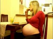 Girl With Big Belly Eating
