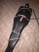 Bound and exposed in a rubber sleepsack