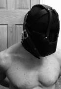 Hooded, gagged and locked in a [m]uzzle... (Bonus pic and vid in comments)