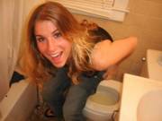 another surprised girl on a toilet