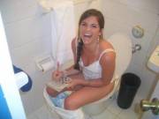 Smart Girl with Crossword Puzzle on Toilet