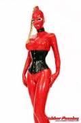 Rubber whore in red latex