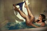 Carly Craig in a bathtub