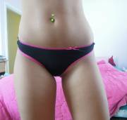 Pink and black thong with a little bow