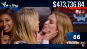 Barbara Dunkelman and Ashley Jenkins kissing on the Extra Life stream