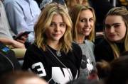 Try to ignore the chick with the eyebrows and enjoy Chloe Grace Moretz and that smirk