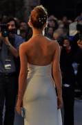 Emma Watson's cheeks revealed by a tight dress