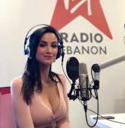 Comedian Crystal Marie showing her personality on a radio show