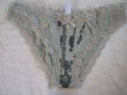 My sister's frilly grey panties. They soaked up cum quick, just like my sister.