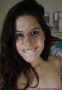 Cute amateur is really happy with cum on her face
