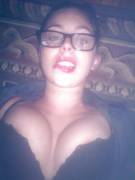Busty, lip-biting, spectacled cumslut