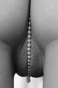 Baby girl loves her pearls.
