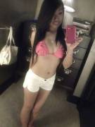 Brown Filipina selfie in tight white shorts and pink bikini top