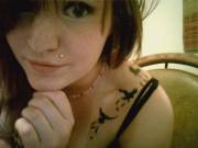 Pierced and tatted amateur brunette.