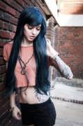 Blue hair, tattoos