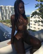 Bria Myles in brown Swimsuit