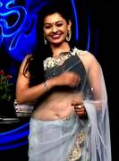 Pooja Kumar from a ETV family show [Slight Underboob]