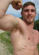 Muscle jock showing his pits