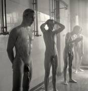 Young workers shower at the end of the day at the Rubber Factory (Germany 1954, Herbert List)
