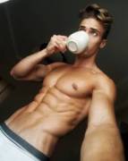 Drinking his morning coffee