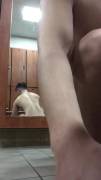 Beating off in front of the mirror