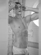 Showering in his underwear