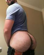 Showing off his round booty