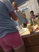 Tight pink boxers brushing teeth