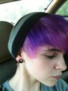Purple hairr and a small piercing