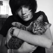Cute emo boy with a cute cat