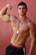 Nick Cooper from AllAmericanGuys showing off those muscles