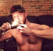DeviantOtter lighting his pipe