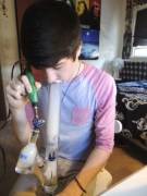 Young dude and his bong