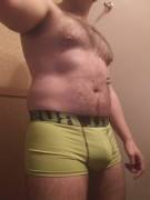 Showing off some lime green trunks.