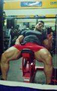 Franco Exequiel Dominguez (aka Amerigo Jackson) lying back in a tight shirt with legs spread at the gym