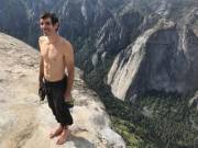 Free-climber Alex Honnold smiles after climbing the 3000 foot tall El Capitan monolith without a rope