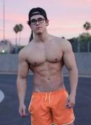 A pair of glasses is a sexy accessory to those muscles!