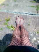 Black toes in fishnet 